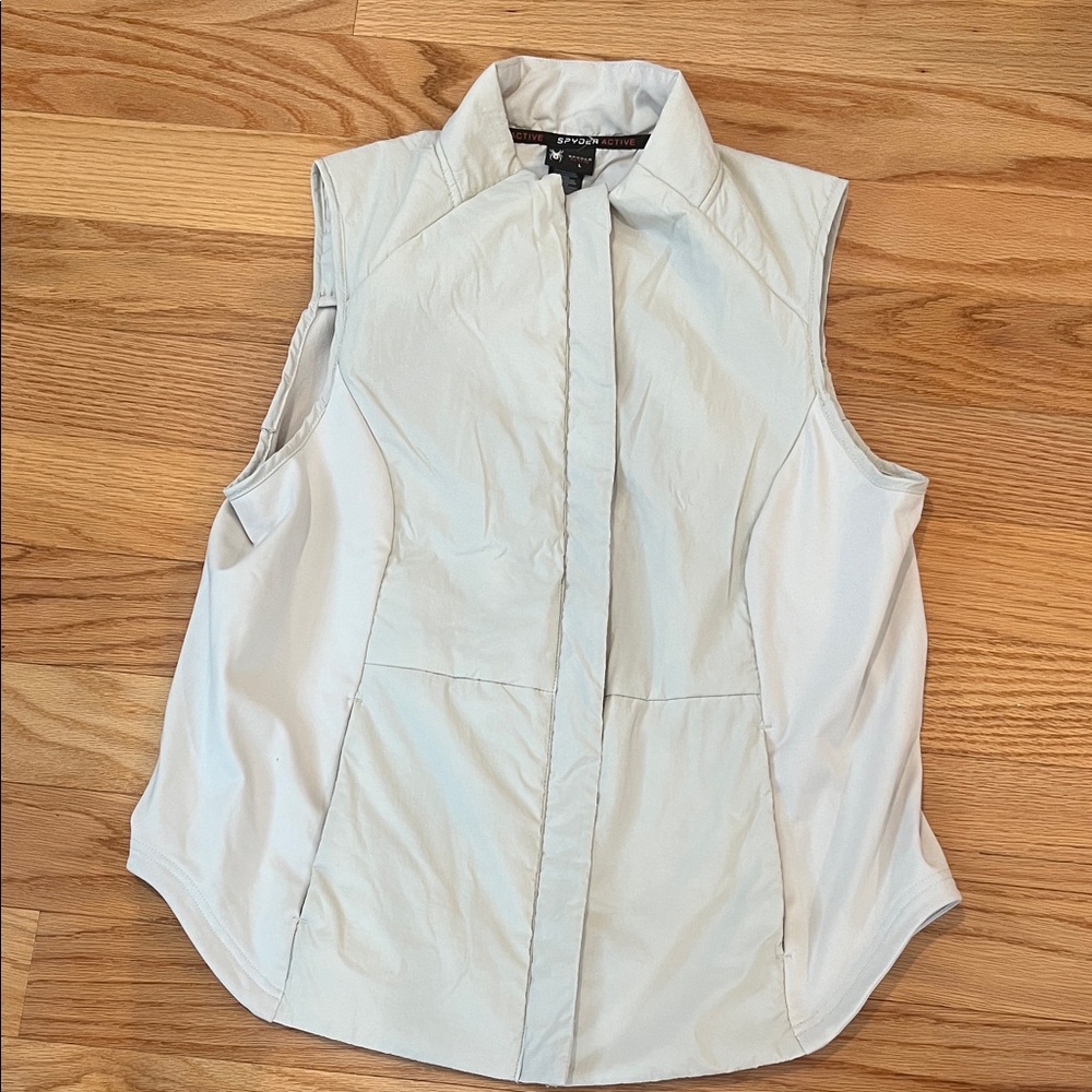 Women’s spyder active vest sz L. Light tan.